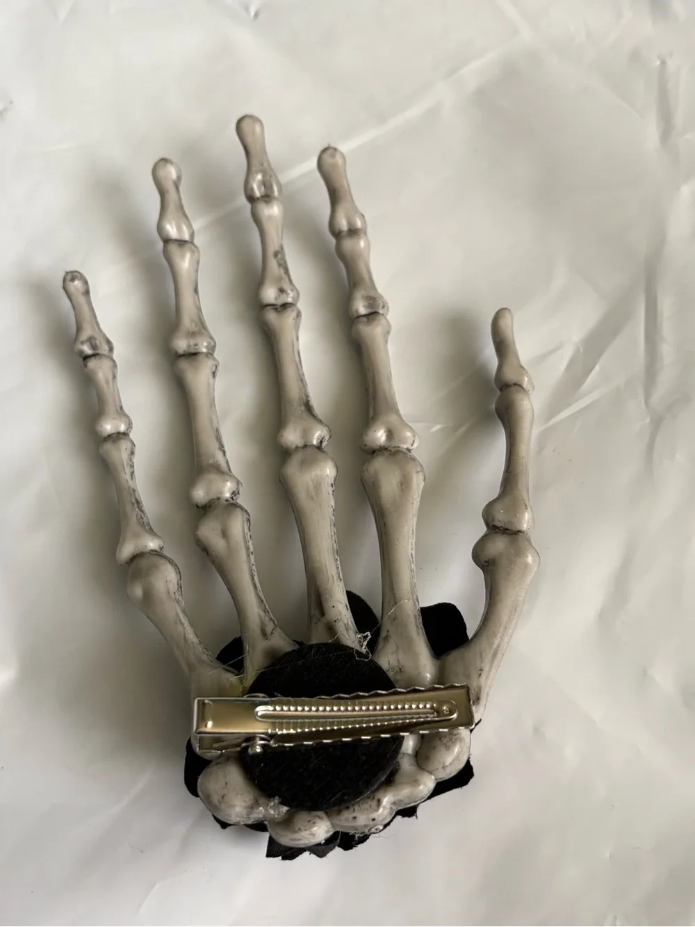 Gothic-style skeleton hand hair clip